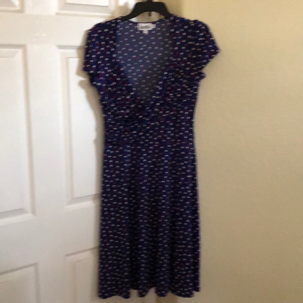 Blue polka dot wrap dress